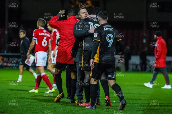 251117 - Swindon Town v Newport County - Sky Bet League 2 - Newport County manager Michael Flynn and Newport County forward Frank Nouble (10) celebrate after their sides 1-0 win