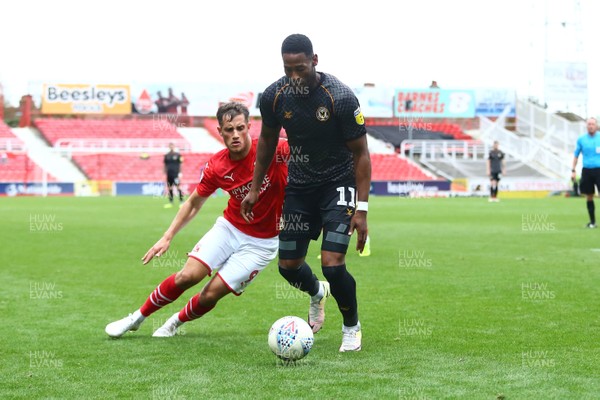 280919 - Swindon Town v Newport County - EFL SkyBet League 2 - Jamille Matt of Newport County takes on Jerry Rates of Swindon Town