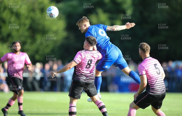 140717 - Taffs Well v Cardiff City, Pre-season Friendly - Danny Ward of Cardiff City wins the ball