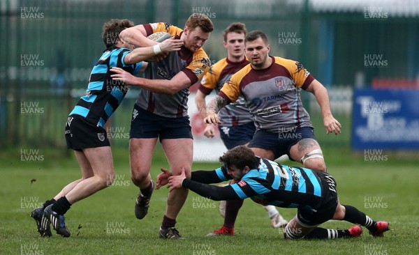 050119 - Tata Steel RFC v Cardiff - WRU National Cup - Jack Brooks of Tata Steel is tackled by Martin Roberts and Steffan Jones of Cardiff