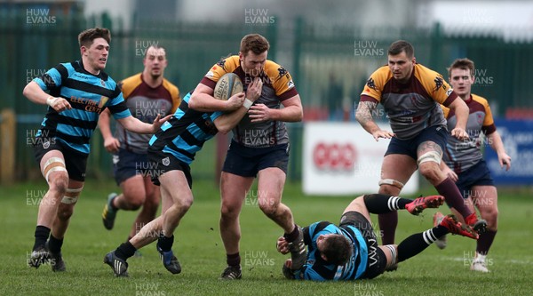 050119 - Tata Steel RFC v Cardiff - WRU National Cup - Jack Brooks of Tata Steel is tackled by Martin Roberts and Steffan Jones of Cardiff