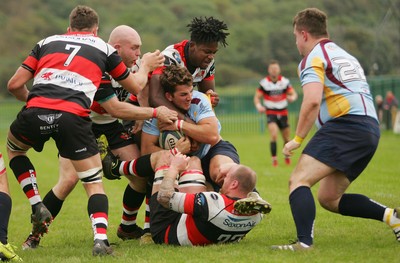 081016 Tata Steel RFC v Pontypool RFC - SWALEC Championship -Jackob Williams of Tata Steel is tackled by Richard East and areth Rusby Davies(on ground) of Pontypool