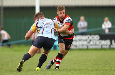 081016 Tata Steel RFC v Pontypool RFC - SWALEC Championship -Kieran Meek of Pontypool is tackled by Ryan Hall of Tata Steel