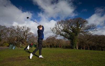 130321 Golf returns in Wales - One of the first players to take to the course, Fred Dineen, aged 12 from Cardiff, plays a shot at Cardiff Golf Club on the day that lockdown restrictions were eased in Wales for outside sports including golf and tennis