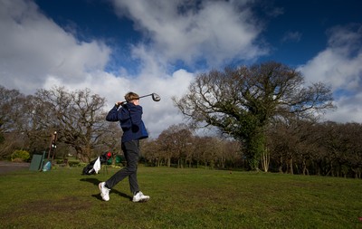 130321 Golf returns in Wales - One of the first players to take to the course, Fred Dineen, aged 12 from Cardiff, plays a shot at Cardiff Golf Club on the day that lockdown restrictions were eased in Wales for outside sports including golf and tennis