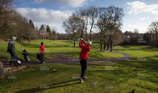 130321 Golf returns in Wales - One of the first players to take to the course plays a shot at Cardiff Golf Club on the day that lockdown restrictions were eased in Wales for outside sports including golf and tennis