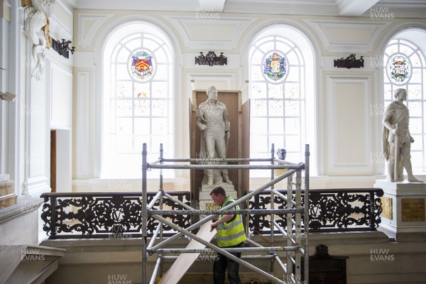 240720 - Picture shows Sir Thomas Picton statue in Cardiff City Hall being boxed up before its removal, after the council voted for it to be removed due to Picton's links to the slave trade