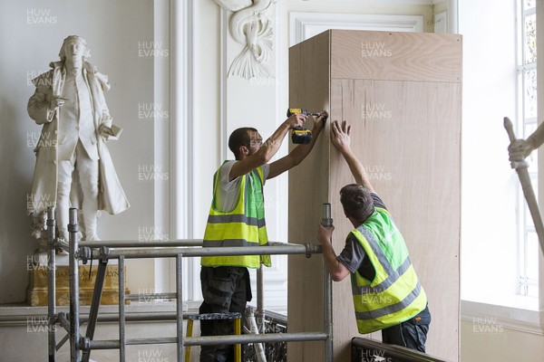 240720 - Picture shows Sir Thomas Picton statue in Cardiff City Hall being boxed up before its removal, after the council voted for it to be removed due to Picton's links to the slave trade