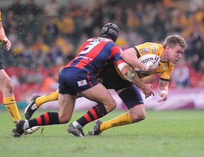 03.04.08 - Millennium Magic 2008 Rugby League Castleford Tigers v Wakefield Trinity Wildcats Tigers' Michael Shenton is tackled by Tony Martin 