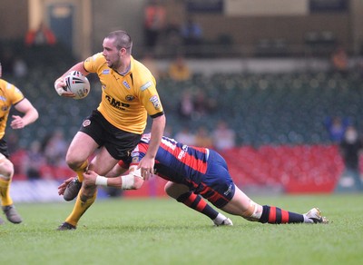 03.04.08 - Millennium Magic 2008 Rugby League Castleford Tigers v Wakefield Trinity Wildcats Tigers' Craig Huby is tackled by Duncan MacGillivray 