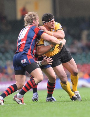 03.04.08 - Millennium Magic 2008 Rugby League Castleford Tigers v Wakefield Trinity Wildcats Tigers' Michael Korkidasis tackled by Oliver Wilkes 