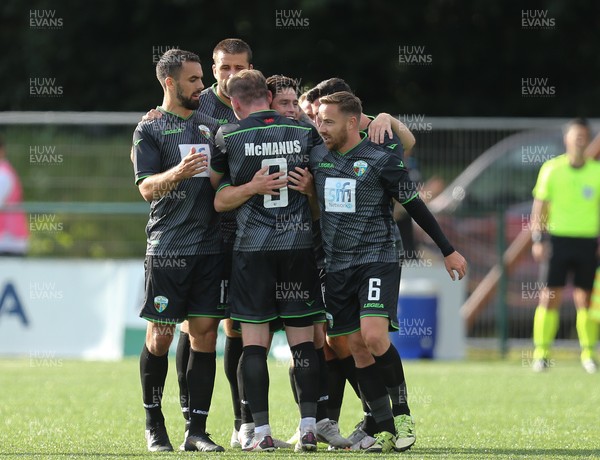 290721 - The New Saints FC v KF Kauno Zalgiris, Europa Conference League 2nd qualifying round, 2nd leg - Danny Redmond of The New Saints celebrates with team mates after scoring the opening goal