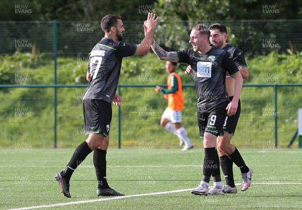 290721 - The New Saints FC v KF Kauno Zalgiris, Europa Conference League 2nd qualifying round, 2nd leg - Declan McManus of The New Saints right is congratulated by Jordan Williams of The New Saints after scoring the third goal