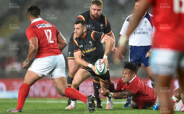 160617 - Tonga v Wales - American Express Pasifika Challenge - Gareth Davies of Wales is tackled by Sonatane Takulua of Tonga