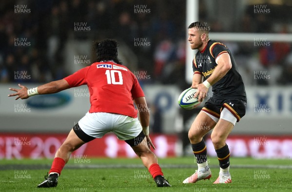 160617 - Tonga v Wales - American Express Pasifika Challenge - Gareth Davies of Wales takes on Latiume Fosita of Tonga