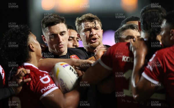 241022 - Tonga v Wales - Rugby League World Cup 2021 - Players from both sides square up