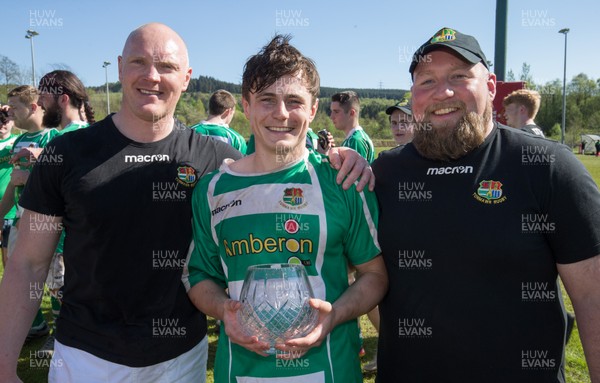 050518 - Tonmawr v Alltwen, Division 3 West Central B - Tonmawr captain Geraint Smith with coaches Ross Pugh, left, and Anthony Edwards celebrate winning the Division 3 West Central B title