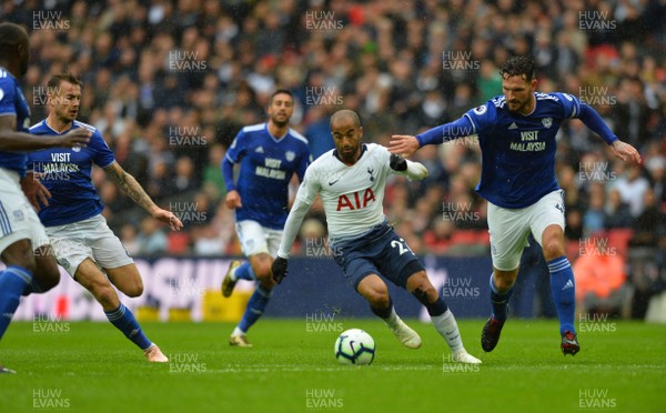 061018 - Tottenham Hotspur v Cardiff City - Premier League -  Lucas Moura of Tottenham Hotspur vies with Sean Morrison of Cardiff City