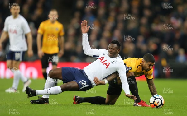 070218 - Tottenham Hotspur v Newport County, FA Cup Round 4 Replay - Victor Wanyama of Tottenham Hotspur competes with Joss Labadie of Newport County for the ball