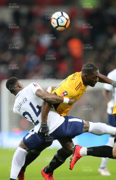 070218 - Tottenham Hotspur v Newport County, FA Cup Round 4 Replay - Frank Nouble of Newport County competes with Serge Aurier of Tottenham Hotspur
