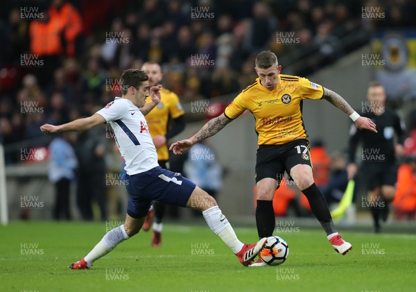 070218 - Tottenham Hotspur v Newport County, FA Cup Round 4 Replay - Scot Bennett of Newport County takes on Harry Winks of Tottenham Hotspur