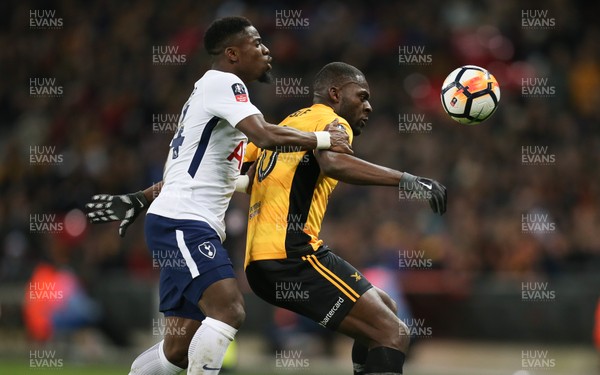 070218 - Tottenham Hotspur v Newport County, FA Cup Round 4 Replay - Frank Nouble of Newport County holds off Serge Aurier of Tottenham Hotspur