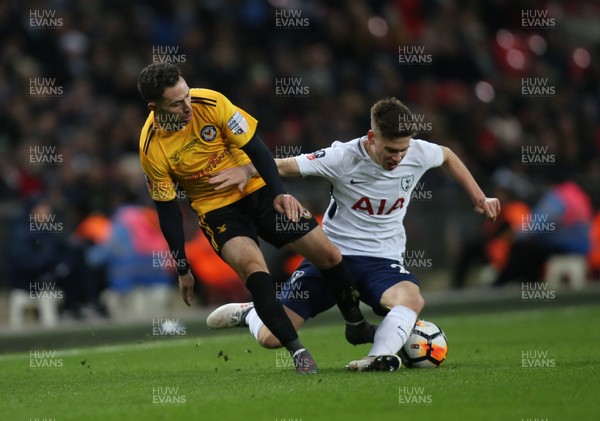 070218 - Tottenham Hotspur v Newport County, FA Cup Round 4 Replay - Robbie Willmott of Newport County and Juan Foyth of Tottenham Hotspur compete for the ball