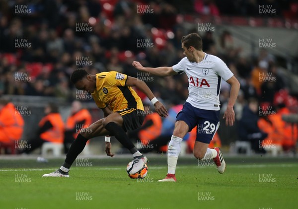 070218 - Tottenham Hotspur v Newport County, FA Cup Round 4 Replay - Shawn McCoulsky of Newport County and Harry Winks of Tottenham Hotspur compete for the ball