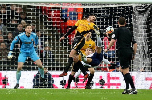 070218 - Tottenham Hotspur v Newport County - FA Cup Fourth Round Replay -  Ben Tozer of Newport blocks a spectacular overhead effort from Eric Lamela of Spurs
