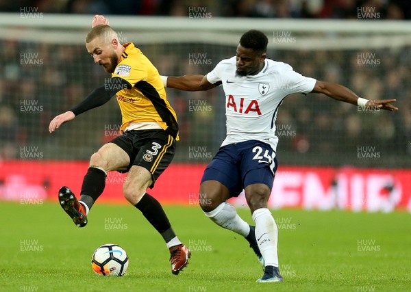 070218 - Tottenham Hotspur v Newport County - FA Cup Fourth Round Replay -  Dan Butler of Newport and Serge Aurier of Spurs