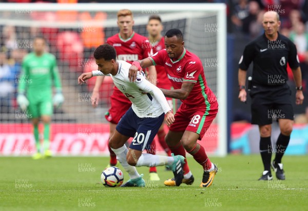 160917 - Tottenham Hotspur v Swansea City - Premier League - Jordan Ayew of Swansea City battles with Dele Alli of Tottenham Hotspur 