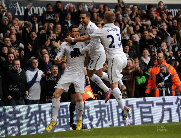 090213 Tottenham Hotspur v Newcastle United - Barclays Premier League - Gareth Bale celebrates his goal for Spurs with team mates Aaron Lennon and Lewis Holtby 