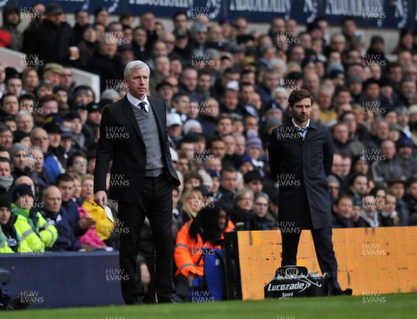 090213 Tottenham Hotspur v Newcastle United - Barclays Premier League - Managers Alan Pardew of Newcastle and Andre Villas-Boas of Spurs watch the action 