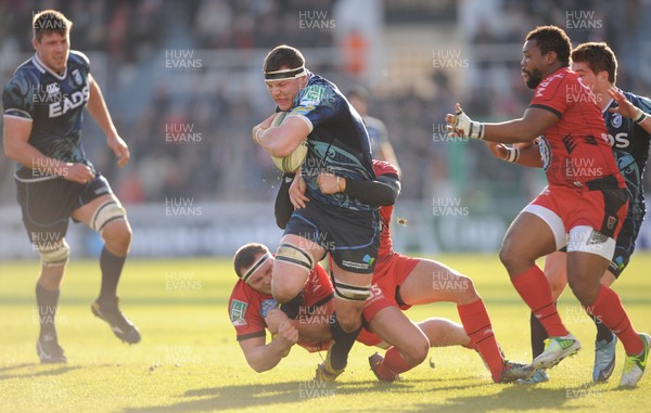 120113 - Toulon v Cardiff Blues - Heineken Cup -Robin Copeland of Cardiff Blues is tackled by Xavier Chiocci and Alexis Paulisson of Toulon