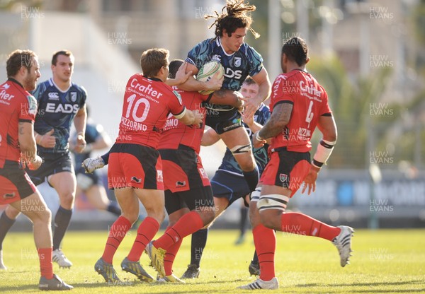 120113 - Toulon v Cardiff Blues - Heineken Cup -Josh Navidi of Cardiff Blues is tackled by Mathieu Bastareaud of Toulon