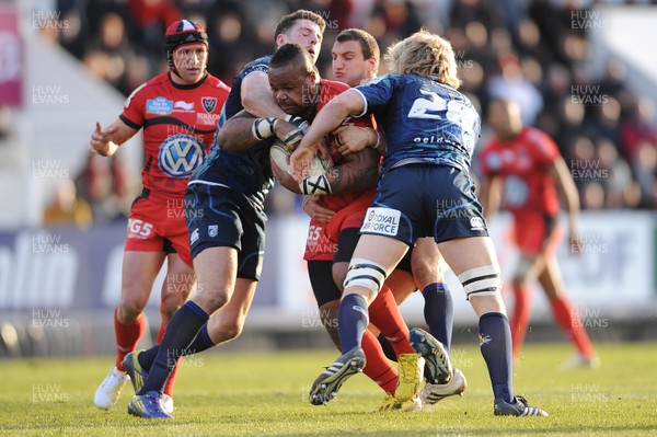 120113 - Toulon v Cardiff Blues - Heineken Cup -Mathieu Bastareaud of Toulon is tackled by Alex Cuthbert and Luke Hamilton