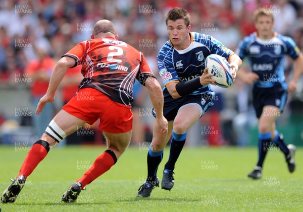 23.05.10 - Cardiff Blues v Toulon - Amlin Challenge Cup Final 2010 - Ceri Sweeney of Cardiff Blues is tackled by Phillip Fitzgerald of Toulon. 