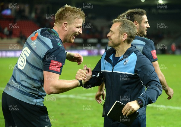201017 - Toulouse v Cardiff Blues - European Rugby Challenge Cup - Macauley Cook of Cardiff Blues celebrates with Danny Wilson at the end of the game