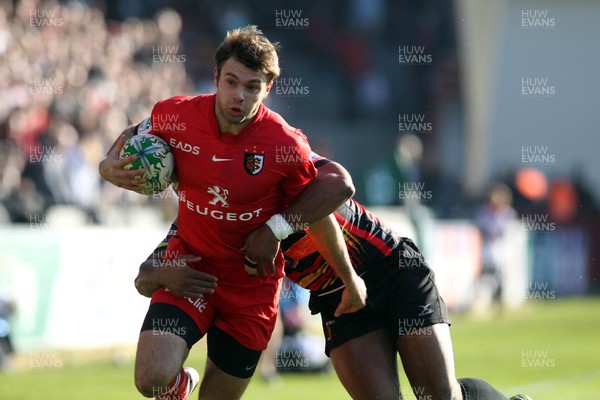 15.01.11 -Toulouse v Dragons, Heineken Cup -  Vincent Clerc of Toulouse is tackled by Aled Brew of Dragons 