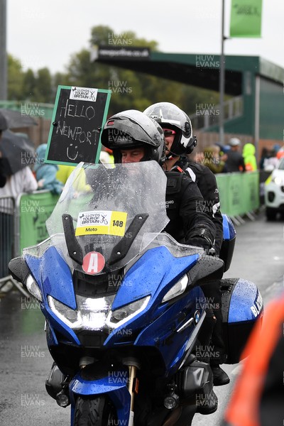 070925 - Picture shows the lead motorcycle greeting fans with “Hello Newport” sign from the Geraint Thomas National Velodrome of Wales as Geraint Thomas embarks on his last ever  race in Wales and takes on the last leg of the Tour of Britain from Newport to Cardiff to end his career