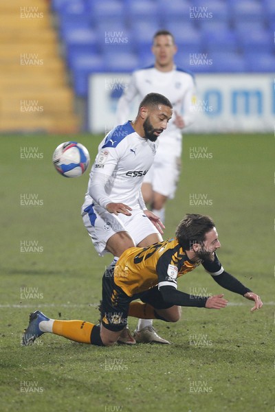 020321 - Tranmere Rovers v Newport County - Sky Bet League 2 - Josh Sheehan of Newport County is pushed to the ground by Liam Feeney of Tranmere Rovers