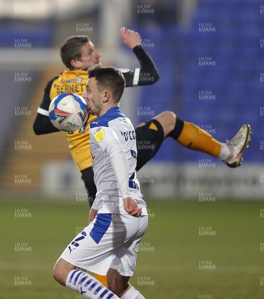020321 - Tranmere Rovers v Newport County - Sky Bet League 2 - Scot Bennett of Newport County and Lee O'Connor of Tranmere Rovers who gets the ball in his mouth