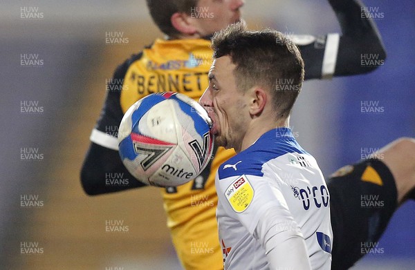 020321 - Tranmere Rovers v Newport County - Sky Bet League 2 - Scot Bennett of Newport County and Lee O'Connor of Tranmere Rovers who gets the ball in his mouth