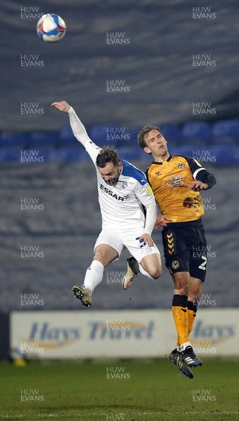 020321 - Tranmere Rovers v Newport County - Sky Bet League 2 - Mickey Demetriou of Newport County and Danny Lloyd of Tranmere Rovers 