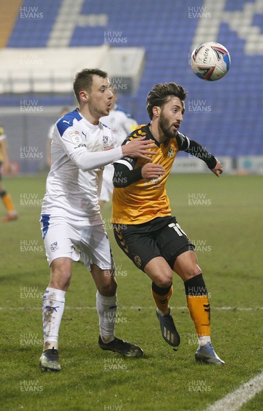 020321 - Tranmere Rovers v Newport County - Sky Bet League 2 - Josh Sheehan of Newport County is held by Lee O'Connor of Tranmere Rovers