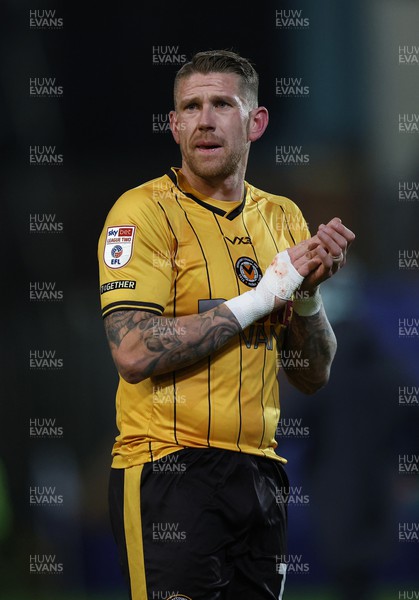 091223 - Tranmere Rovers v Newport County - Sky Bet League 2 - Dejected Scot Bennett of Newport County applauds the travelling fans