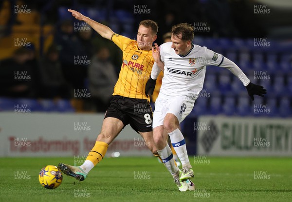 091223 - Tranmere Rovers v Newport County - Sky Bet League 2 - Bryn Morris of Newport County and Regan Hendry of Tranmere Rovers