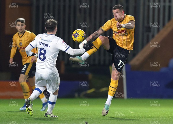 091223 - Tranmere Rovers v Newport County - Sky Bet League 2 - Scot Bennett of Newport County and Regan Hendry of Tranmere Rovers