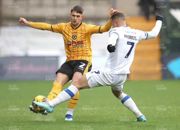 091223 - Tranmere Rovers v Newport County - Sky Bet League 2 - Lewis Payne of Newport County and Kieron Morris of Tranmere Rovers