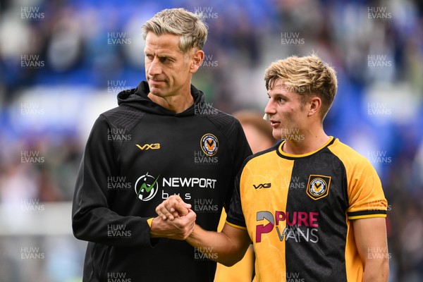 130925 - Tranmere Rovers v Newport County - Sky Bet League 2 - David Hughes, Manager of Newport County, shakes hands with Tom Davies of Newport County at the end of the game